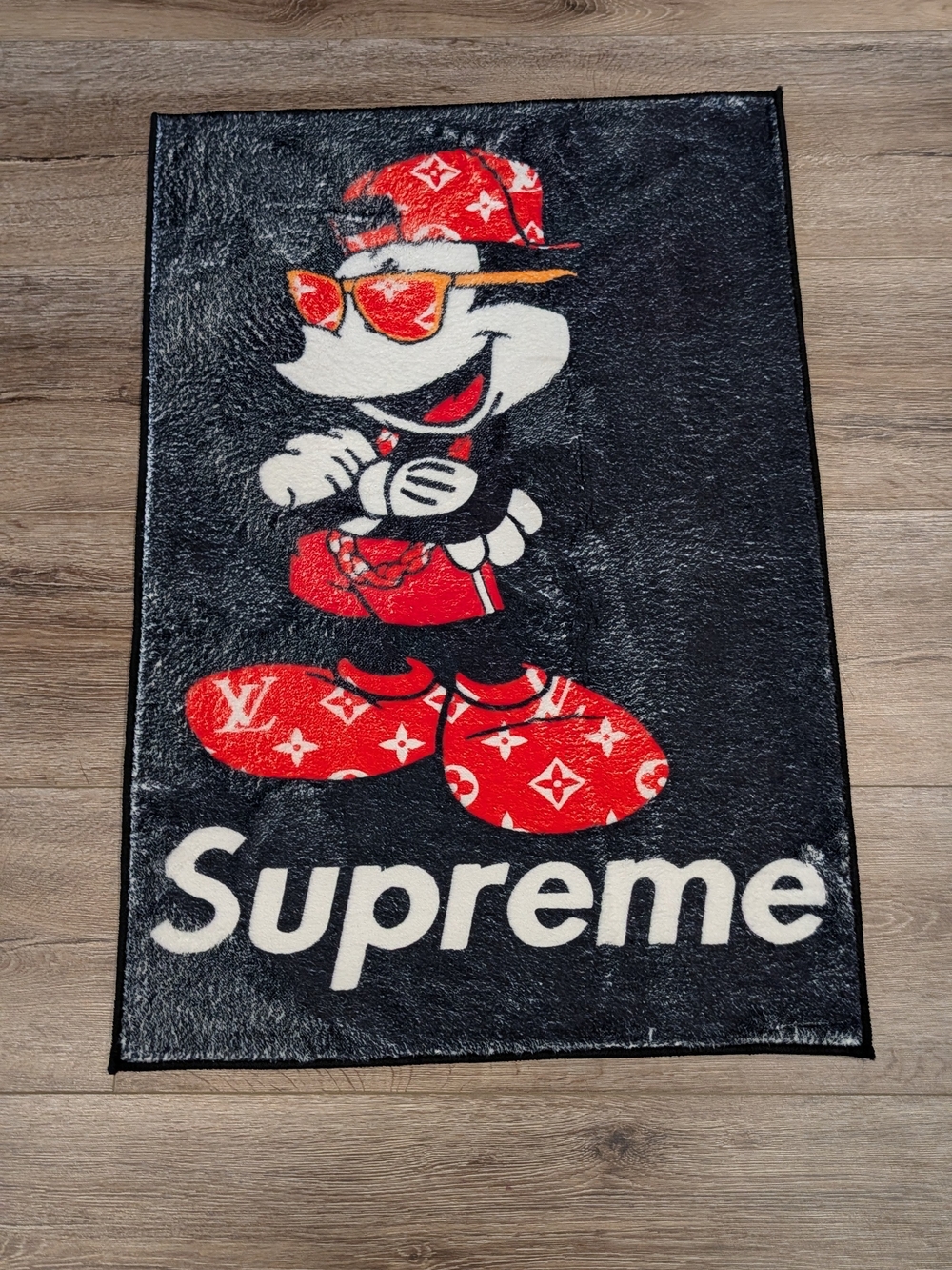 Black and Red Graphic Character Area Rug - Supreme